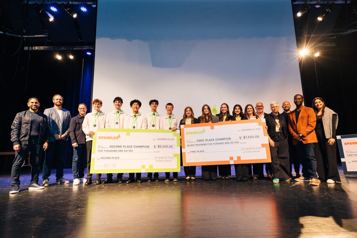 2025 Spring Cohort winners on stage
